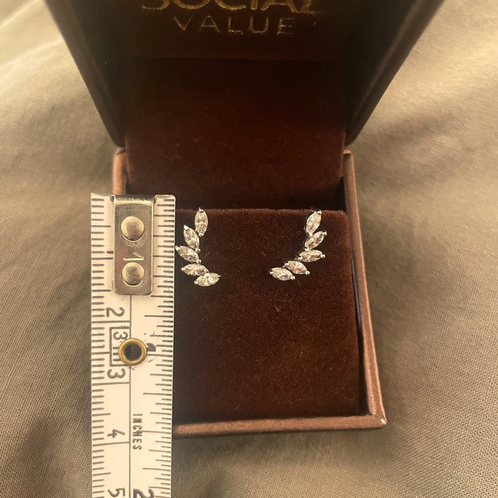 Cz and Sterling silver plated crawlers.